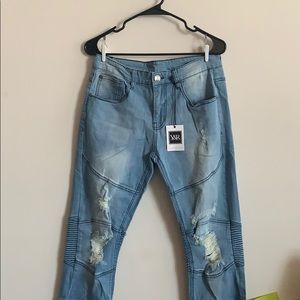 Light wash motorcycle jeans